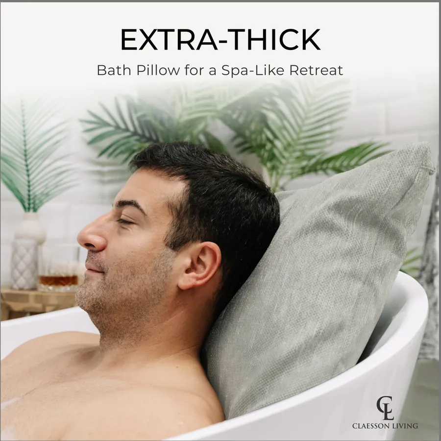 Man leaning back on the extra-thick bath pillow